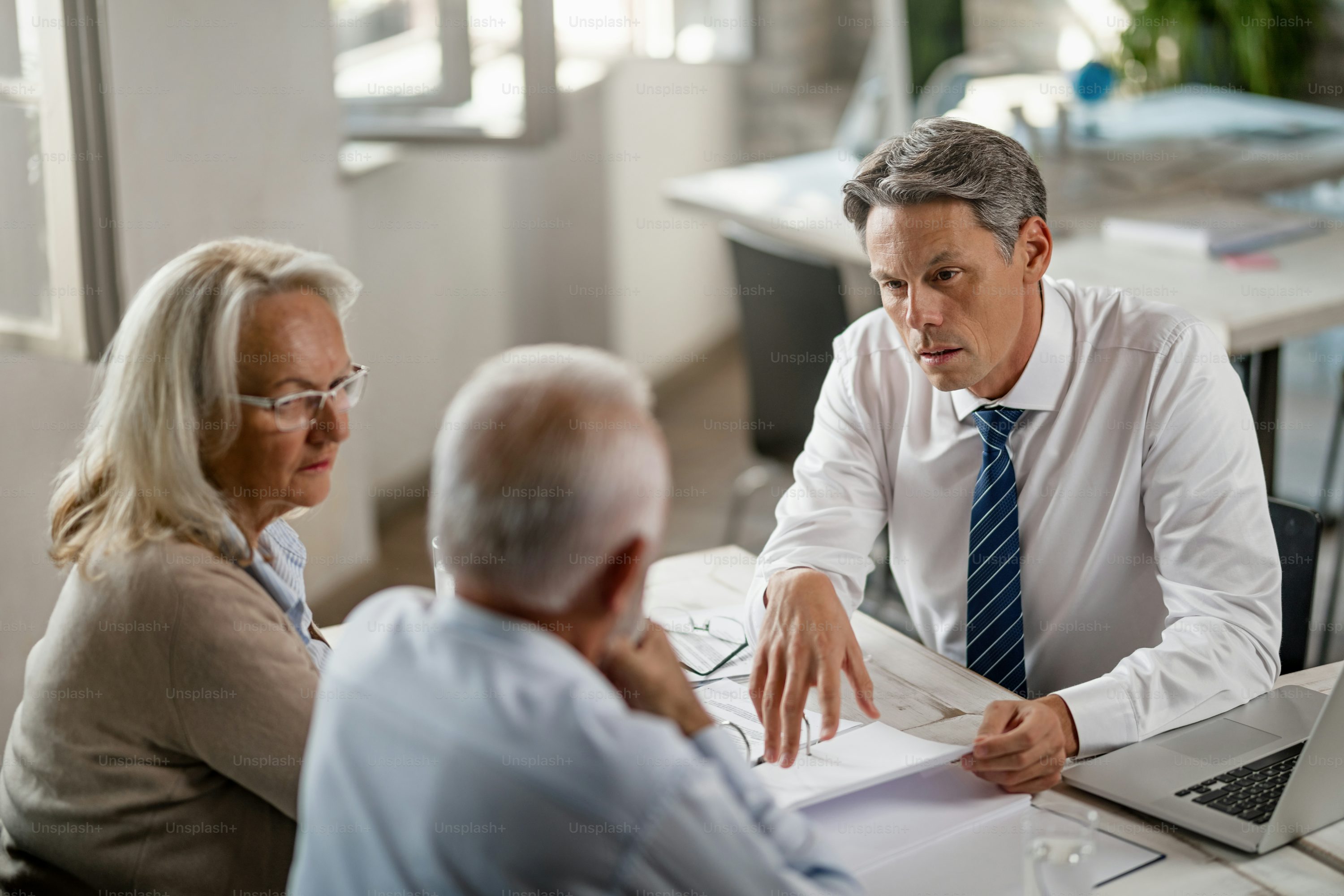 Business advisor consulting with senior executives on strategic planning, leadership alignment, and organizational growth through fractional advisory board services.
